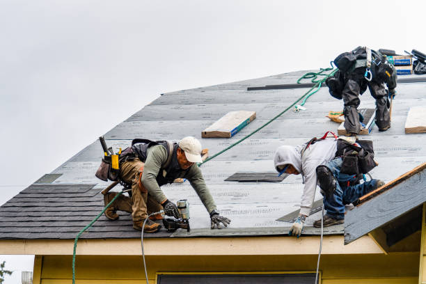 Professional Gutter Installation technician working in Arvada, CO